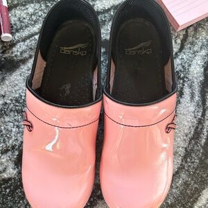 Dansko Glossy Pink Mules with Black Trim